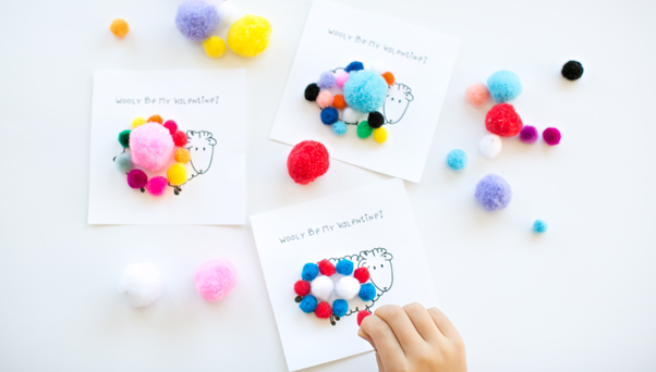  Get the sheep printable here, and pick up some pom poms  here .  